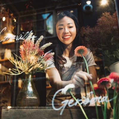 A Photo Of A Girl Holding A Flower